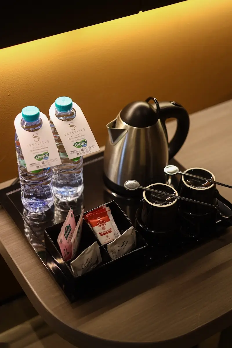 Hotel room amenities including towels and toiletries